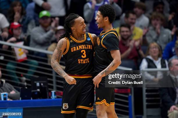 Mikale Stevenson and Jimel Cofer of the Grambling State Tigers celebrate in the second half against the Montana State Bobcats in the First Four game...