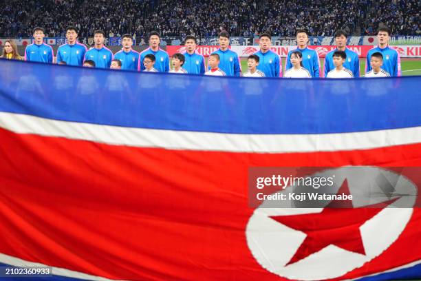 North Korea Squad with their national flag during the FIFA World Cup Asian 2nd qualifier match between Japan and North Korea at National Stadium on...