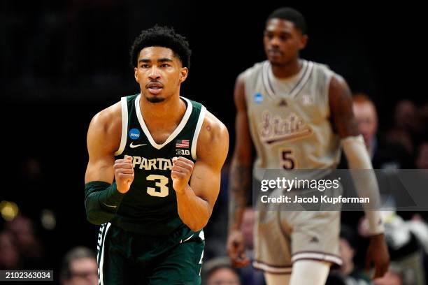Jaden Akins of the Michigan State Spartans celebrates a basket against the Mississippi State Bulldogs during the second half in the first round of...