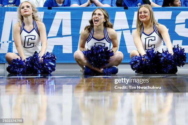 Creighton Bluejays cheerleaders look on in the first half against the Akron Zips in the first round of the NCAA Men's Basketball Tournament at PPG...