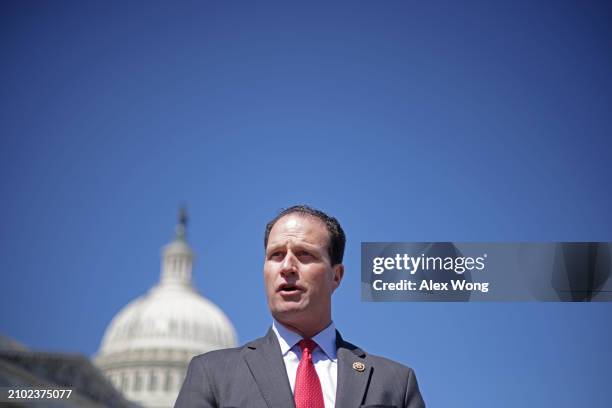 Rep. August Pfluger speaks during a news conference in front of the U.S. Capitol on March 21, 204 in Washington, DC. Rep. Pfluger and Rep. Chris...