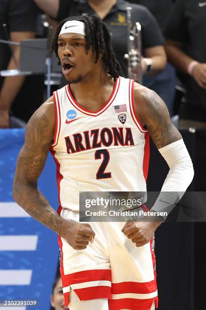 Caleb Love of the Arizona Wildcats reacts during the first half against the Long Beach State 49ers in the first round of the NCAA Men's Basketball...