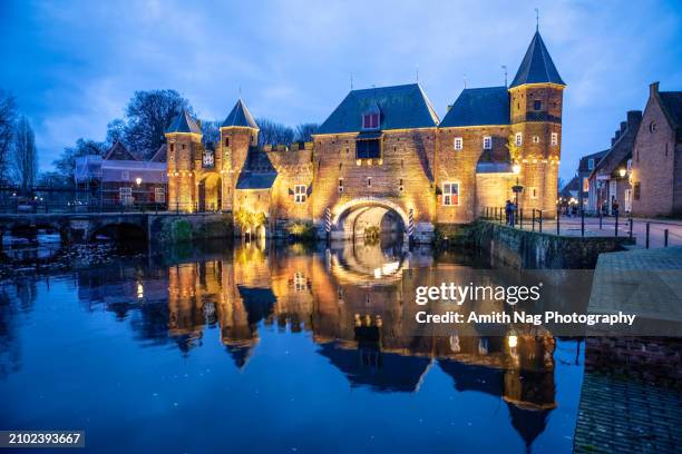 medieval koppelpoort gate in amersfoort - canal disney stock pictures, royalty-free photos & images