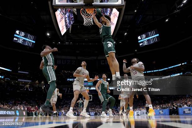 Malik Hall of the Michigan State Spartans dunks the ball against the Mississippi State Bulldogs during the second half in the first round of the NCAA...