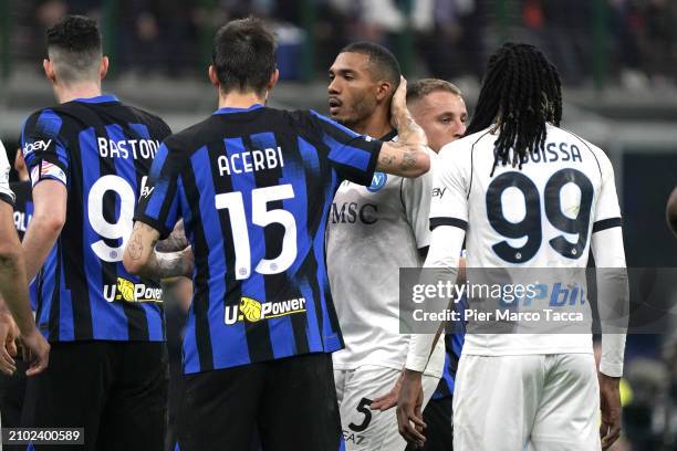 Francesco Acerbi of FC Internazionale talks with Juan Jesus of SSC Napoli during the Serie A TIM match between FC Internazionale and SSC Napoli at...