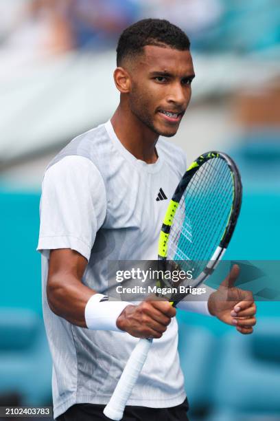 Felix Auger-Aliassime of Canada celebrates after defeating Adam Walton of Australia during their men's singles match during the Miami Open at Hard...