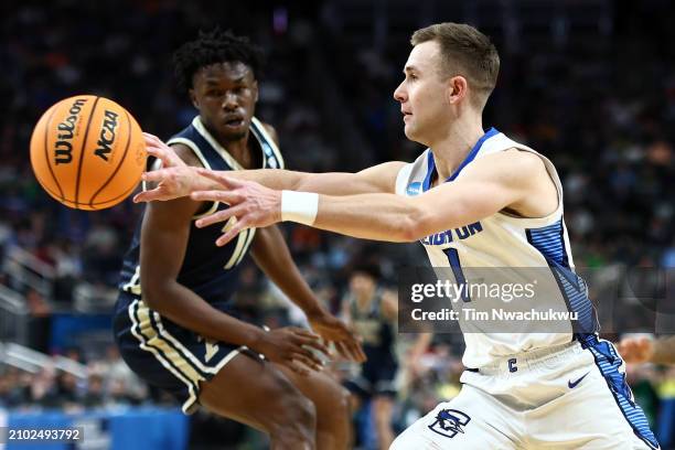 Steven Ashworth of the Creighton Bluejays makes a pass in the second half against the Akron Zips in the first round of the NCAA Men's Basketball...