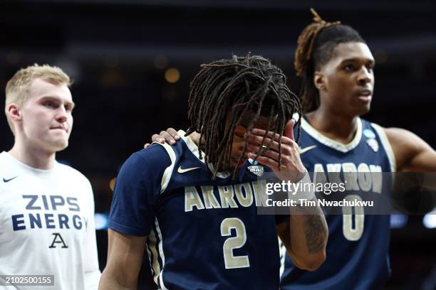 Greg Tribble of the Akron Zips walks off the court after losing 77-60 to the Creighton Bluejays in the first round of the NCAA Men's Basketball...