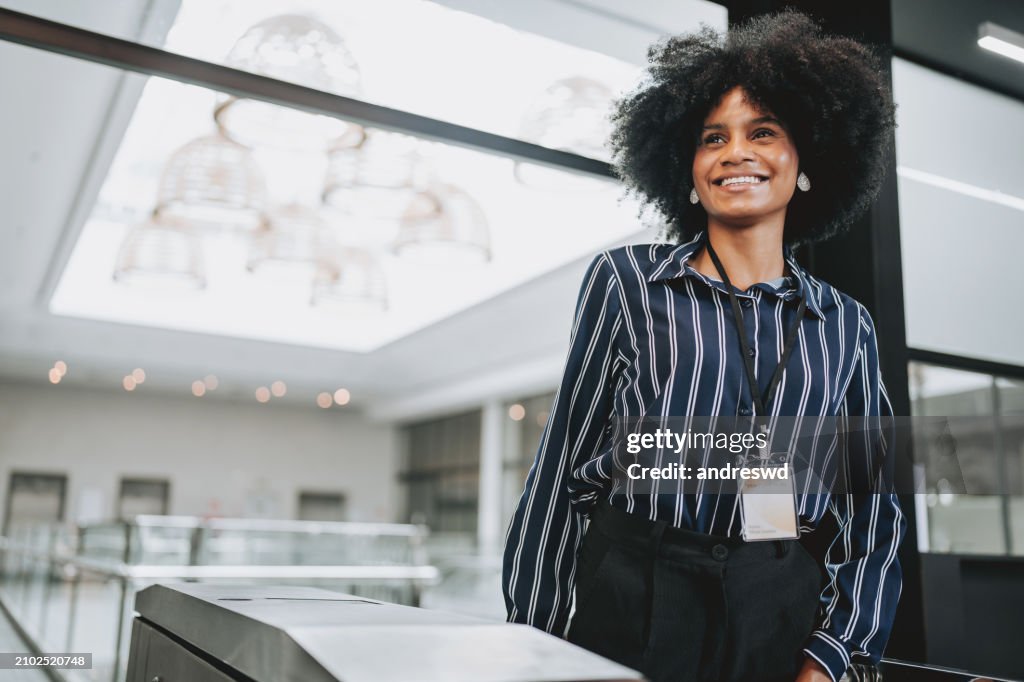 A woman arriving at the business conference