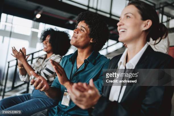 group of people applauding conference - clapping game stock pictures, royalty-free photos & images