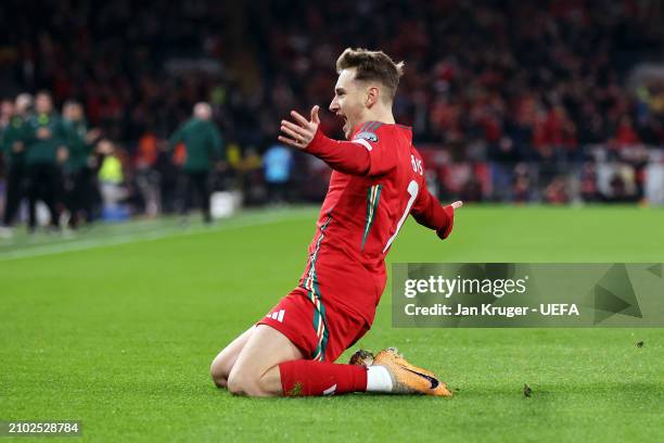 David Brooks of Wales celebrates scoring his team's first goal during the UEFA EURO 2024 Play-Offs Semi-final match between Wales and Finland at...