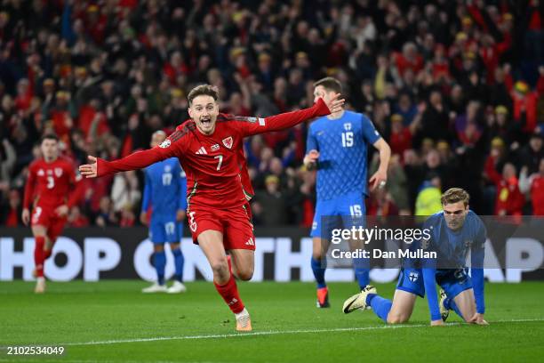 David Brooks of Wales celebrates scoring his team's first goal during the UEFA EURO 2024 Play-Offs Semi-final match between Wales and Finland at...