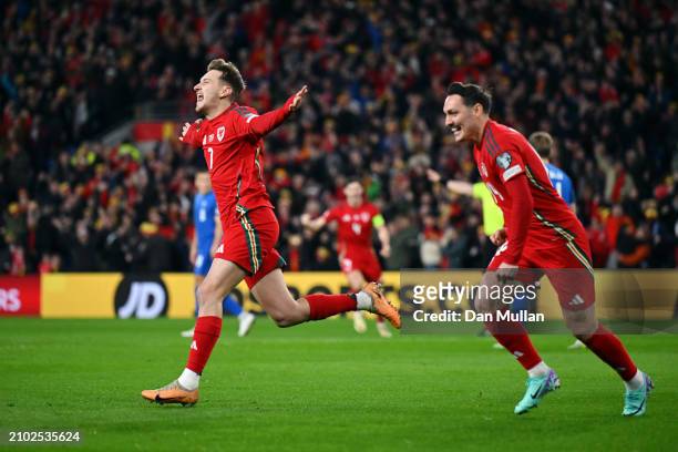 David Brooks of Wales celebrates scoring his team's first goal during the UEFA EURO 2024 Play-Offs Semi-final match between Wales and Finland at...