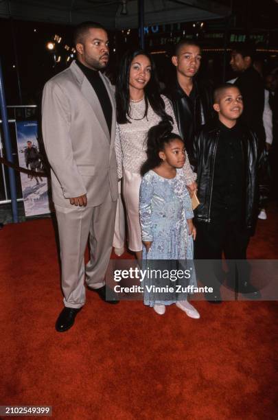 American rapper and actor Ice Cube with his wife, Kimberly Woodruff, and their children, O'Shea Jackson Jr, Darrell Jackson, and Kareema Jackson,...