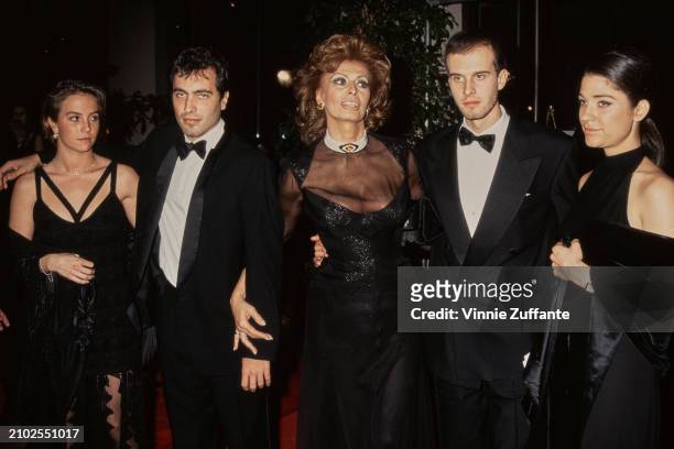 Italian conductor Carlo Ponti Jr and guest, Italian actress Sophia Loren, and Italian film director Edoardo Ponti attend the 52nd Golden Globe...