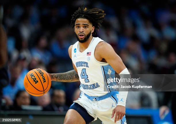 Davis of the North Carolina Tar Heels dribbles against the Wagner Seahawks during the second half in the first round of the NCAA Men's Basketball...