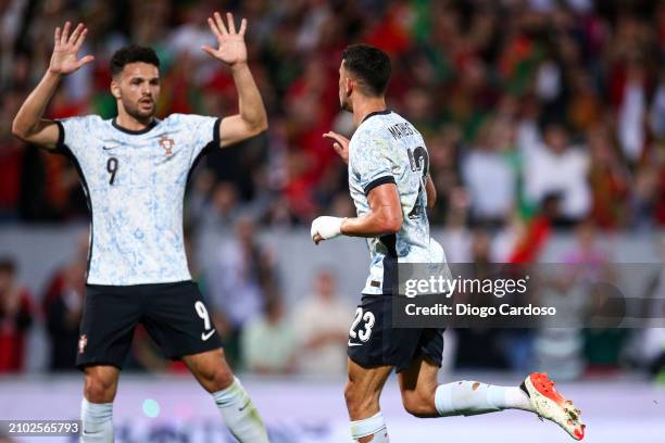 Matheus Nunes of Portugal celebrates with Goncalo Ramos of Portugal after scoring his team's second goal during the international friendly match...