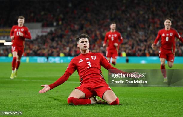 Neco Williams of Wales celebrates scoring his team's second goal during the UEFA EURO 2024 Play-Offs Semi-final match between Wales and Finland at...