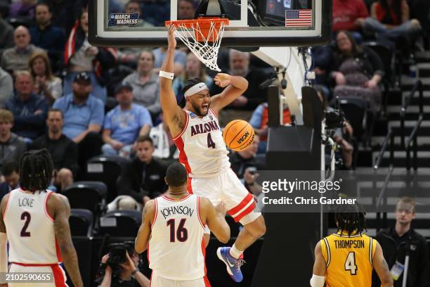 Kylan Boswell of the Arizona Wildcats dunks the ball during the second half against the Long Beach State 49ers in the first round of the NCAA Men's...