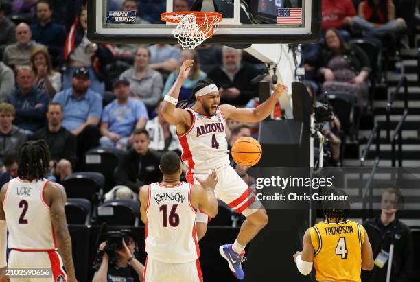 Kylan Boswell of the Arizona Wildcats dunks the ball during the second half against the Long Beach State 49ers in the first round of the NCAA Men's...