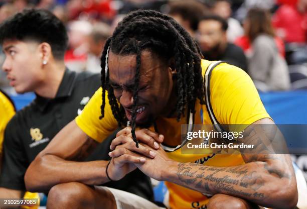 Amari Stroud of the Long Beach State 49ers reacts on the bench as the Arizona Wildcats defeat the Long Beach State 49ers 85-65 in the first round of...
