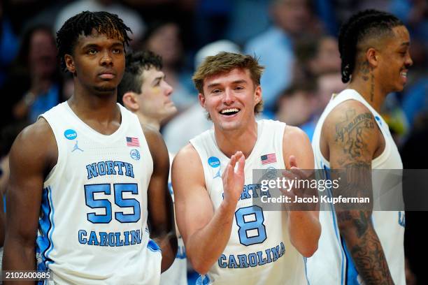 Paxson Wojcik of the North Carolina Tar Heels celebrates as Harrison Ingram looks on against the Wagner Seahawks during the second half in the first...