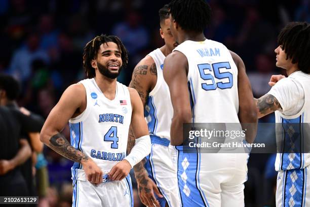 North Carolina Tar Heels huddle during the second half of the first round of the NCAA Men's Basketball Tournament against the Wagner Seahawks at...