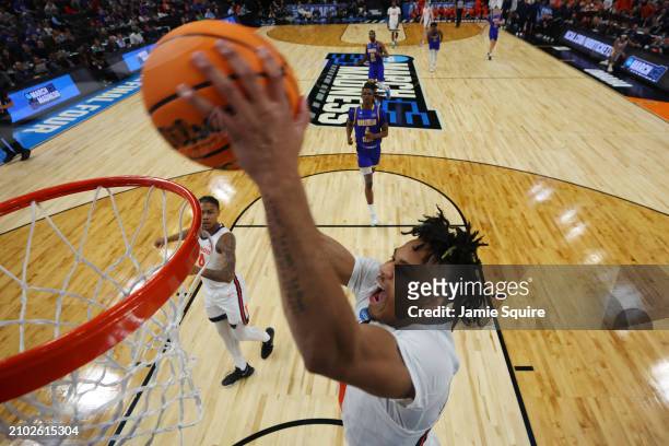 Terrence Shannon Jr. #0 of the Illinois Fighting Illini dunks the ball against the Morehead State Eagles during the first half in the first round of...