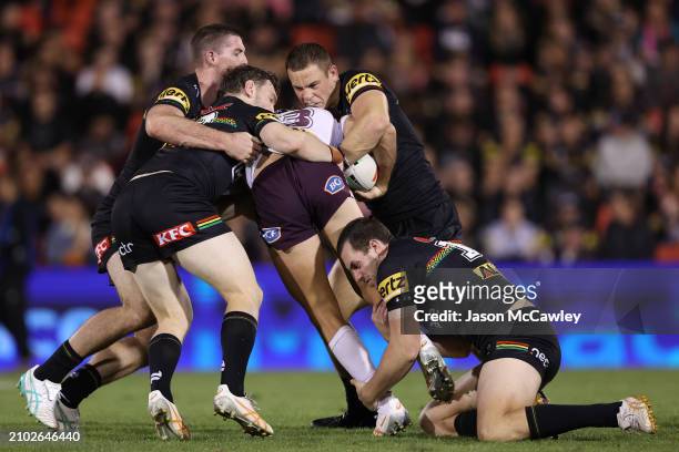 Patrick Carrigan of the Broncos is tackled during the round three NRL match between Penrith Panthers and Brisbane Broncos at BlueBet Stadium on March...