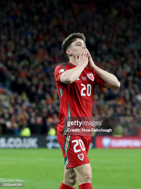 Daniel James of Wales celebrates scoring the teams fourth goal during the UEFA EURO 2024 Play-Offs Semi-final between Wales and Finland at Cardiff...