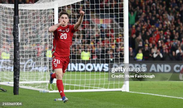 Daniel James of Wales celebrates scoring the teams fourth goal during the UEFA EURO 2024 Play-Offs Semi-final between Wales and Finland at Cardiff...