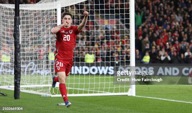 Daniel James of Wales celebrates scoring the teams fourth goal during the UEFA EURO 2024 Play-Offs Semi-final between Wales and Finland at Cardiff...