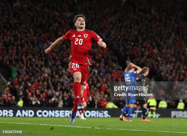 Daniel James of Wales celebrates scoring his team's fourth goal during the UEFA EURO 2024 Play-Offs Semi-final match between Wales and Finland at...