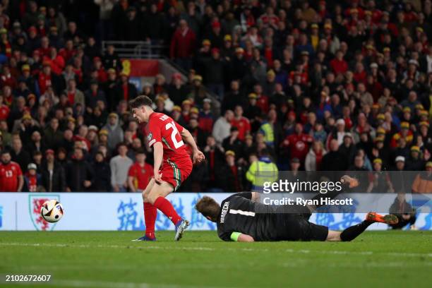 Daniel James of Wales scores his team's fourth goal past Lukas Hradecky of Finland during the UEFA EURO 2024 Play-Offs Semi-final match between Wales...