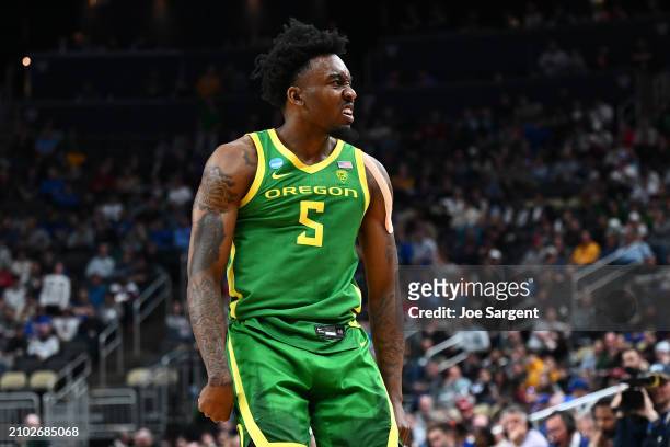 Jermaine Couisnard of the Oregon Ducks reacts after hitting a three pointer against the South Carolina Gamecocks in the second half in the first...