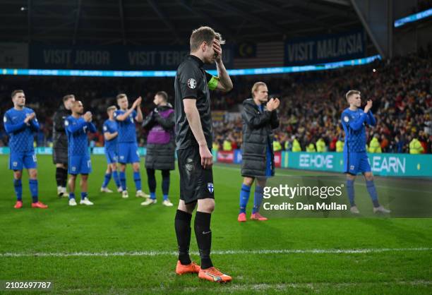 Lukas Hradecky of Finland looks dejected after the team's defeat in the UEFA EURO 2024 Play-Offs Semi-final match between Wales and Finland at...