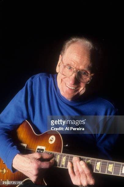 Les Paul appears in a portrait taken At Iridium Nightclub on March 18, 2002 in New York City.