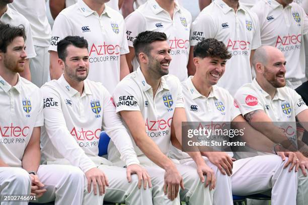 Durham players Mark Wood Paul Coughlin and Ben Raine share a during the Durham CCC photocall ahead of the 2024 season at Seat Unique Riverside on...