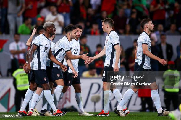 Goncalo Ramos of Portugal celebrates with team mates after scoring his team's fifth goal during the international friendly match between Portugal and...