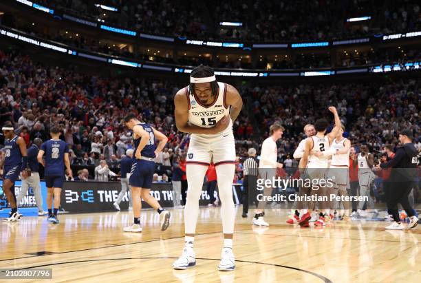 DaRon Holmes II of the Dayton Flyers celebrates defeating the Nevada Wolf Pack 63-60 in the first round of the NCAA Men's Basketball Tournament at...