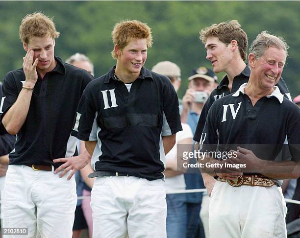 British Prince William , Prince Harry and their father Prince Charles, the Prince of Wales share a joke with England Polo player Luke Tomlinson at...