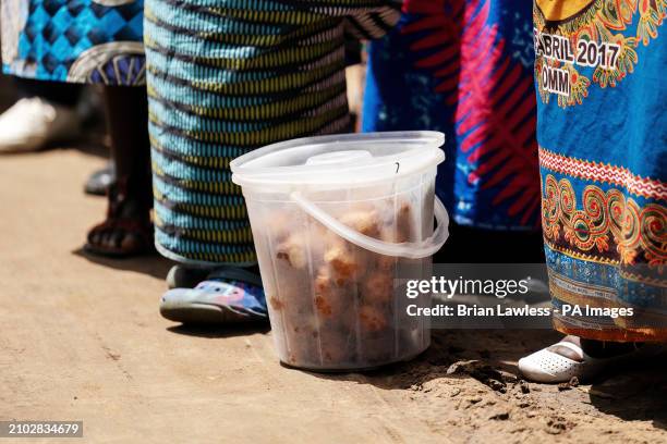 Container of cooked sweet potato ready for sale in the Balaka district of Malawi. Trocaire is training farmers in new diverse crops that can tolerate...