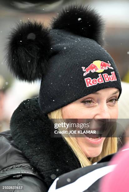 Former alpine ski racer Lindsey Vonn is pictured on the sidelines of the men's Downhill event, that eventually was cancelled due to bad weather...