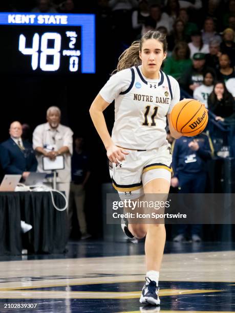 Notre Dame Fighting Irish guard Sonia Citron dribbles the ball down court during the game between the Kent State Golden Flashes and the Notre Dame...