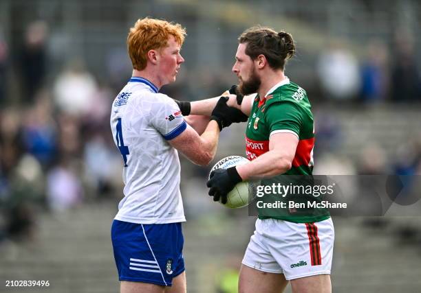 Monaghan , Ireland - 24 March 2024; Padraig O'Hora of Mayo and Ryan O'Toole of Monaghan tussle during the Allianz Football League Division 1 match...