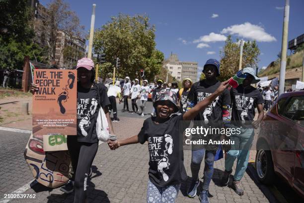 Thousands of people hold a constitutional democracy march to mark the 30th anniversary of the end of the apartheid regime and the transition to...