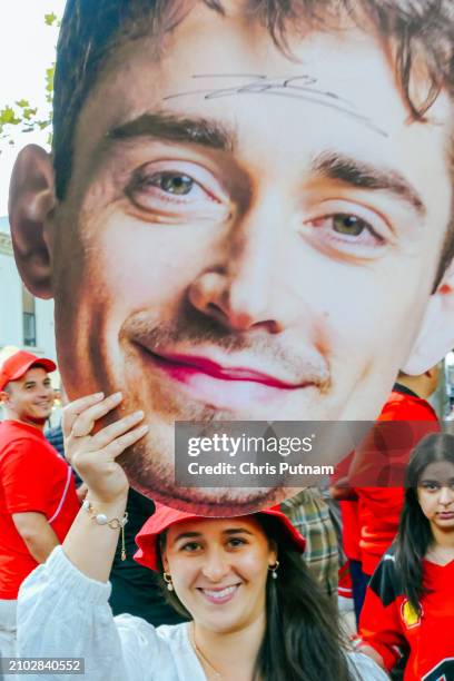 Fans celebrate Scuderia Ferrari driver Carlos Sainz winning the Australian Grand Prix with Charles LeClerc of Ferrari in second place in Melbourne,...