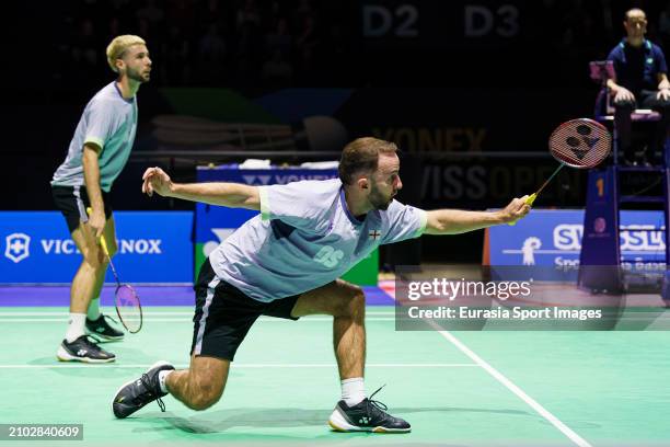 Ben Lane and Sean Vendy of England in action against Muhammad Shohibul Fikri and Bagas Maulana of Indonesia during The Yonex Swiss Open Badminton at...