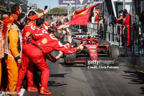 Carlos Sainz of Spain and Scuderia Ferrari returns to the pits after winning the 2024 Australian Grand Prix at Albert Park in Melbourne, Australia.
