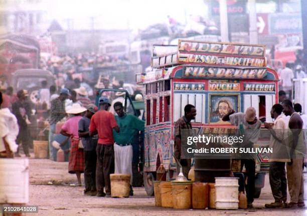 Gasoline is sold on the black market for about 9USD per gallon 26 May 1994 in a section of Port Au Prince, Haiti known as Kuwait City. Dominican...